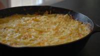 Cast Iron Cheesy Potatoes
